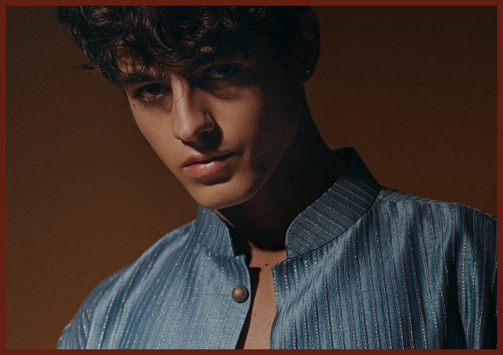 Person wearing a azure silk kurta